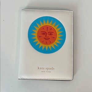 Kate Spade White Passport Holder with Sun Design